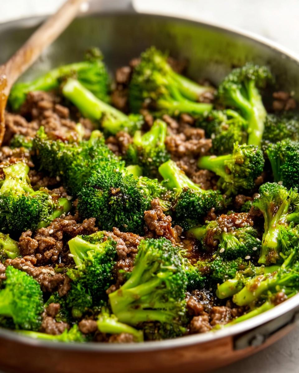 Close-up of Keto Hamburger Broccoli Skillet in a pan, featuring ground beef and vibrant broccoli florets.